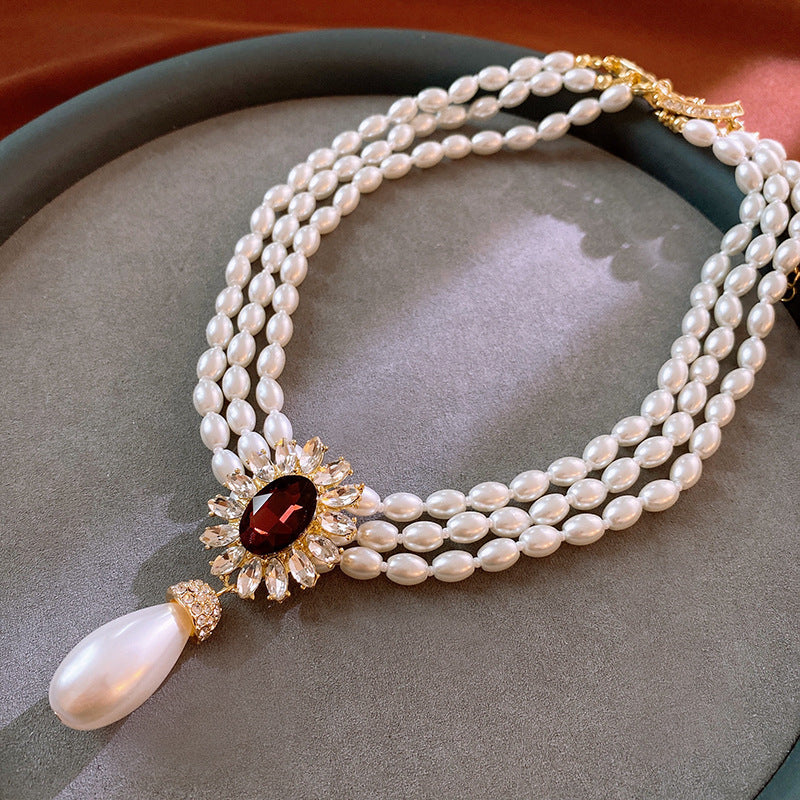 French minimalist luxury diamond-accented artificial pearl necklace, vintage-stylesophisticated piece