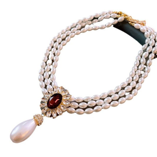 French minimalist luxury diamond-accented artificial pearl necklace, vintage-stylesophisticated piece